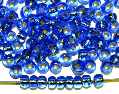 Rocailles von Preciosa Ornella Tschechien hergestellt, 
 blau transp. mit Silbereinzug
