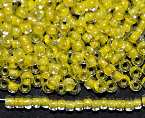 Rocailles von Preciosa Ornella Tschechien, 
 kristall mit Farbeinzug gelb und lüster, 
 