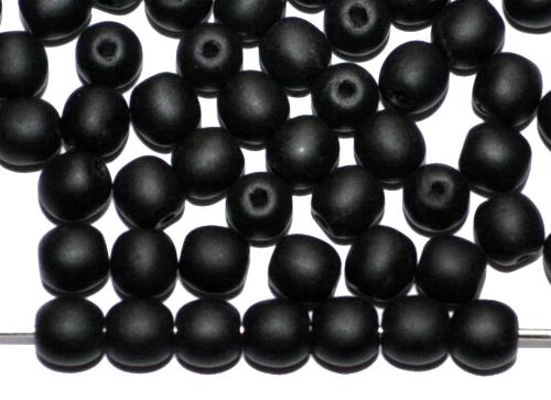 Glasperlen rund
 schwarz opak matt,
 hergestellt in Gablonz / Tschechie