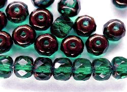 facettierte Glasperlen Linsen
 smaragdgrün bronziert,
 hergestellt in Gablonz / Tschechien