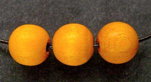 Holzperle rund
 orange,
 hergestellt in Smržovka / Tschechien