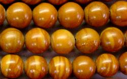 Halbedelsteinperlen 
 aus Gold Leaf Agate (Achat)