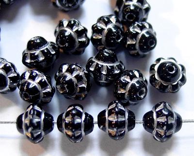 Glasperlen Doppelkegel 
 schwarz mit Silberauflage;
 hergestellt in Gablonz / Tschechien
 