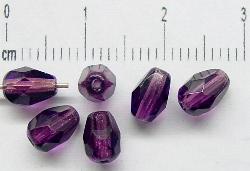 facettierte Glasperlen Tropfen 
 violett transp.,
 hergestellt in Gablonz / Tschechien